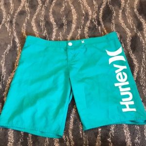Teal Hurley junior 11 board shorts